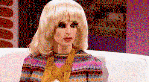 Animated GIF of a blonde-wigged drag queen giving a skeptical, unimpressed stare